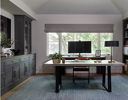 Beautiful home office with built in bookshelves and a beautiful large window in Houston, TX